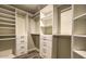 Custom closet with ample shelving and drawers, perfect for organizing clothes and accessories at 25555 N Windy Walk Dr # 69, Scottsdale, AZ 85255