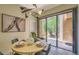 Stylish dining area with sliding glass doors showcasing the outdoor space at 25555 N Windy Walk Dr # 69, Scottsdale, AZ 85255