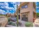 Beautiful home featuring an inviting patio and a backdrop of desert mountains at 25555 N Windy Walk Dr # 69, Scottsdale, AZ 85255