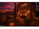 Multi-story home featuring a charming backyard patio with comfortable seating and stunning desert landscape views at 25555 N Windy Walk Dr # 69, Scottsdale, AZ 85255