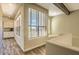 Inviting living area with large windows, natural light, and stylish built-in cabinets at 25555 N Windy Walk Dr # 69, Scottsdale, AZ 85255