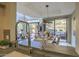 Open-concept living area with outdoor access and contemporary design at 25555 N Windy Walk Dr # 69, Scottsdale, AZ 85255