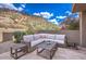 Cozy outdoor patio space with comfortable seating and beautiful mountain views at 25555 N Windy Walk Dr # 69, Scottsdale, AZ 85255