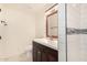 This bathroom features vanity with drawers, tiled shower and modern fixtures at 2721 W Luke Ave, Phoenix, AZ 85017