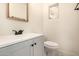 Cozy bathroom features a modern vanity, sink, and toilet at 2721 W Luke Ave, Phoenix, AZ 85017