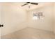 This bedroom features tile floors and natural light at 2721 W Luke Ave, Phoenix, AZ 85017