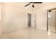 Neutral bedroom with tiled floors, closet, ceiling fan and recessed lighting at 2721 W Luke Ave, Phoenix, AZ 85017