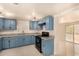 Stylish kitchen with shaker cabinets, modern appliances, and plenty of counter space at 2721 W Luke Ave, Phoenix, AZ 85017