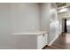 Hallway with a granite countertop and base cabinets at 2761 W Via Calabria --, Phoenix, AZ 85086