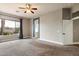 Bright bedroom with plush carpet and a large window for ample natural light at 2761 W Via Calabria --, Phoenix, AZ 85086