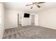 Large bedroom featuring neutral walls and carpet, with a view of the ensuite bathroom at 3049 W Santa Cruz Ave, San Tan Valley, AZ 85144