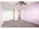 Bedroom with a ceiling fan, carpet, and a closet at 3049 W Santa Cruz Ave, San Tan Valley, AZ 85144