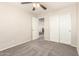 Bright bedroom featuring neutral walls, ceiling fan, and carpeted flooring at 3049 W Santa Cruz Ave, San Tan Valley, AZ 85144