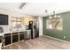 Spacious kitchen featuring stainless steel appliances, dark cabinets and tiled floors at 3049 W Santa Cruz Ave, San Tan Valley, AZ 85144
