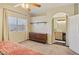 Spacious bedroom with large window, neutral walls, and en-suite bathroom at 3440 E Southern Ave # 1042, Mesa, AZ 85204