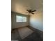 Bedroom with a ceiling fan, neutral paint and street view at 3441 W Windrose Dr, Phoenix, AZ 85029