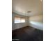 Bedroom with window and carpeted floor at 3441 W Windrose Dr, Phoenix, AZ 85029