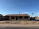Charming single-story home with a well-kept gravel yard and covered parking at 3441 W Windrose Dr, Phoenix, AZ 85029
