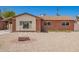 Charming single-story brick home with desert landscaping, creating an inviting curb appeal at 3644 W Maryland Ave, Phoenix, AZ 85019