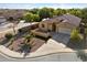 Aerial view of a beautiful single-Gathering home featuring a well-kept front yard and a spacious driveway at 4032 S Santa Rita Pl, Chandler, AZ 85249