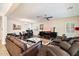 Cozy living area features hardwood floors, comfortable leather seating, and an open layout at 4032 S Santa Rita Pl, Chandler, AZ 85249