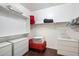 Organized walk-in closet featuring shelving, drawers, and ample storage space at 4032 S Santa Rita Pl, Chandler, AZ 85249