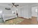 Main bedroom with a TV, ceiling fan, and white furniture, with ensuite bathroom at 4159 E Jasper Dr, Gilbert, AZ 85296