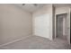 Bedroom with carpet and a closet at 43875 W Baker Dr, Maricopa, AZ 85138