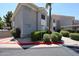 Well-maintained two-story condo featuring lush landscaping and a red tile roof in a residential neighborhood at 5249 E Shea Blvd # 215, Scottsdale, AZ 85254