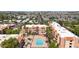 Enjoy this aerial view of the community's amenities, including a pool, lounging area, and beautifully manicured landscaping at 540 N May St # 1109, Mesa, AZ 85201