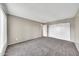 Spacious bedroom featuring neutral walls, carpet and a double door closet at 540 N May St # 1109, Mesa, AZ 85201
