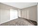 Bedroom featuring neutral walls, carpet and a double door closet at 540 N May St # 1109, Mesa, AZ 85201