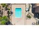 Overhead view of a bright, refreshing pool with multiple lounge chairs and meticulous landscaping for relaxing outdoors at 540 N May St # 1109, Mesa, AZ 85201