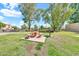 Community space featuring a picnic table and grill in grassy space at 540 N May St # 1109, Mesa, AZ 85201