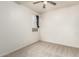 A bright bedroom with a ceiling fan and a window, offering a cozy atmosphere at 5626 W Rainwater Dr, Laveen, AZ 85339