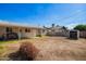 View of backyard with patio and storage shed at 62 W Beall Ave, Mesa, AZ 85210