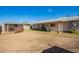 Wide shot of backyard with shed and patio at 62 W Beall Ave, Mesa, AZ 85210
