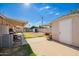 Spacious backyard with a shed, covered patio, and plenty of room for outdoor activities at 62 W Beall Ave, Mesa, AZ 85210