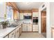 Well-maintained kitchen featuring stainless steel appliances and light-colored countertops at 62 W Beall Ave, Mesa, AZ 85210
