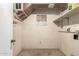 Storage room with wood shelves and natural lighting at 62 W Beall Ave, Mesa, AZ 85210