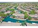 Aerial view of the community featuring a waterway and well maintained landscaping at 705 W Queen Creek Rd # 1201, Chandler, AZ 85248