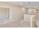 A versatile hallway on the upper level of the home with neutral tones and carpeting at 705 W Queen Creek Rd # 1201, Chandler, AZ 85248
