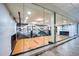 Indoor basketball court with a glass wall that overlooks a pool and other recreational areas at 7167 E Rancho Vista Dr # 2007, Scottsdale, AZ 85251