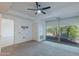 Well-lit bedroom features ceiling fan, carpet, and a large window with outdoor views at 7167 E Rancho Vista Dr # 2007, Scottsdale, AZ 85251