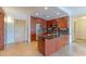 Modern kitchen features stainless steel appliances, dark granite countertops, and wooden cabinets at 7167 E Rancho Vista Dr # 2007, Scottsdale, AZ 85251