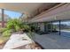 Spacious patio area with tiled flooring and beautiful outdoor plants at 7167 E Rancho Vista Dr # 2007, Scottsdale, AZ 85251