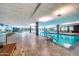 Indoor lap pool featuring floor-to-ceiling windows and lounge chairs for a relaxing swim at 7167 E Rancho Vista Dr # 2007, Scottsdale, AZ 85251