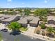 Expansive aerial view of the home, highlighting the neighborhood, landscaping, and mountain views at 8417 W Northview Ave, Glendale, AZ 85305