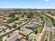 Wide aerial view of the neighborhood showcasing green spaces, pools, and well-maintained streets at 8417 W Northview Ave, Glendale, AZ 85305