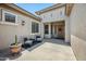 Inviting front porch with stylish decor, a cozy seating area, and a welcoming entrance at 8417 W Northview Ave, Glendale, AZ 85305